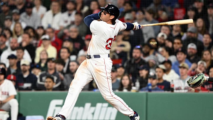 Apr 23, 2025; Boston, Massachusetts, USA; Boston Red Sox first base Triston Casas (36) hits a three-run home run against the Seattle Mariners during the eighth inning at Fenway Park. Mandatory Credit: Brian Fluharty-Imagn Images