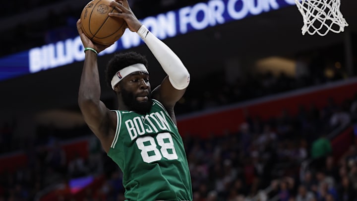 Jan 19, 2026; Detroit, Michigan, USA;  Boston Celtics center Neemias Queta (88) rebounds the ball in the second half against the Detroit Pistons at Little Caesars Arena. Mandatory Credit: Rick Osentoski-Imagn Images