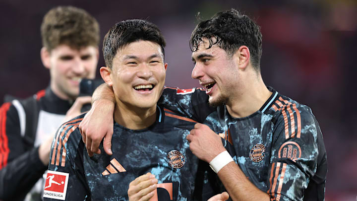 Kim Min-jae and Aleksandar Pavlovic celebrating Bayern Munich's win against Freiburg.