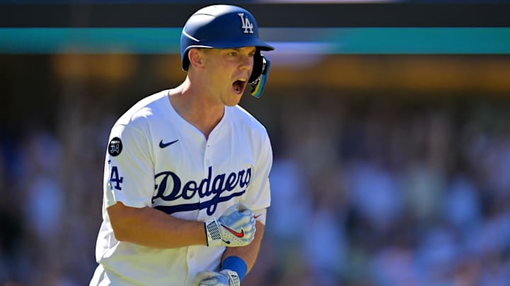 Los Angeles Dodgers catcher Will Smith (16) celebrates as he rounds the bases on a walk-off home run in the ninth inning against the Arizona Diamondbacks at Dodger Stadium on Aug. 31.
