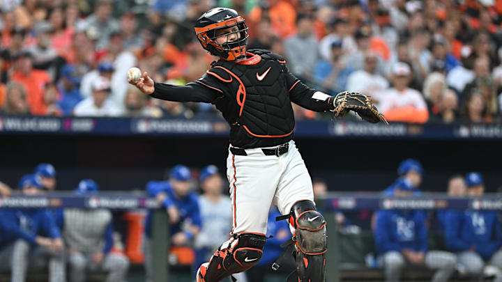 Oct 2, 2024; Baltimore, Maryland, USA; Baltimore Orioles catcher Adley Rutschman (35) throws to first base against the Kansas City Royals in game two of the Wild Card round for the 2024 MLB Playoffs at Oriole Park at Camden Yards. Oct 2, 2024; Baltimore, Maryland, USA; Baltimore Orioles catcher Adley Rutschman (35) throws to first base against the Kansas City Royals in game two of the Wild Card round for the 2024 MLB Playoffs at Oriole Park at Camden Yards.