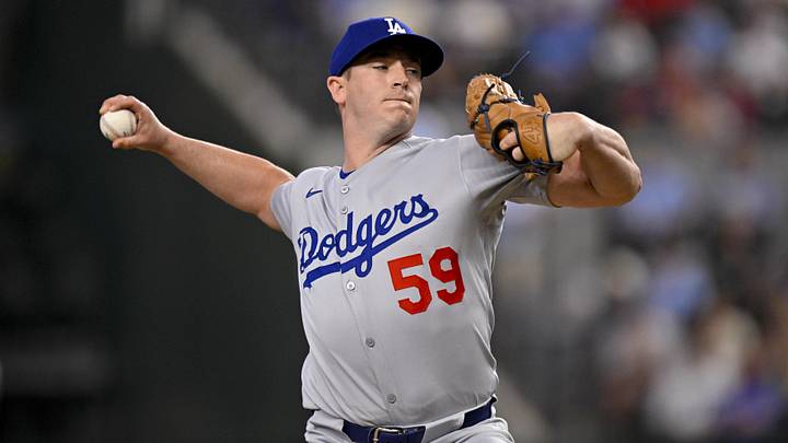 Apr 20, 2025; Arlington, Texas, USA; Los Angeles Dodgers relief pitcher Evan Phillips (59) pitches during the game between the Texas Rangers and the Los Angeles Dodgers at Globe Life Field. Mandatory Credit: Jerome Miron-Imagn Images Apr 20, 2025; Arlington, Texas, USA; Los Angeles Dodgers relief pitcher Evan Phillips (59) pitches during the game between the Texas Rangers and the Los Angeles Dodgers at Globe Life Field. Mandatory Credit: Jerome Miron-Imagn Images