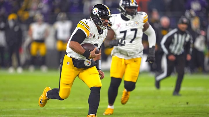 Dec 21, 2024; Baltimore, Maryland, USA; Pittsburgh Steelers quarterback Russell Wilson (3) runs for a gain before fumbling during the second quarter against the Baltimore Ravens against the at M&T Bank Stadium. Mandatory Credit: Mitch Stringer-Imagn Images