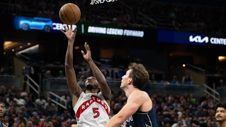 Mar 17, 2024; Orlando, Florida, USA; Toronto Raptors guard Immanuel Quickley (5) shoots the ball