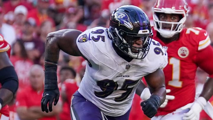 Sep 28, 2025; Kansas City, Missouri, USA; Kansas City Chiefs quarterback Patrick Mahomes (15) runs the ball as Baltimore Ravens linebacker Tavius Robinson (95) defends during the game at GEHA Field at Arrowhead Stadium. Mandatory Credit: Denny Medley-Imagn Images