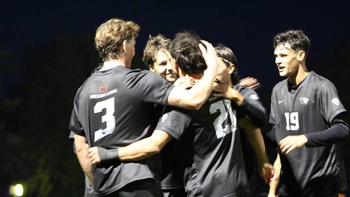 The Oregon State Men's Soccer team congratulates #21 Evan Carlock after he scores the first goal in Wednesday's 3-1 win over Seattle. The Oregon State Men's Soccer team congratulates #21 Evan Carlock after he scores the first goal in Wednesday's 3-1 win over Seattle.