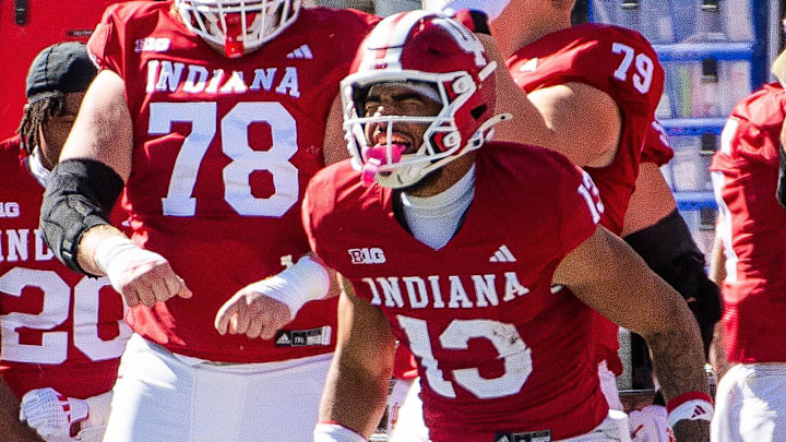 Indiana's Elijah Sarratt (13) celebrates a long gain during the Indiana versus Nebraska football game at Memorial Stadium on Saturday, Oct. 19, 2024. Indiana's Elijah Sarratt (13) celebrates a long gain during the Indiana versus Nebraska football game at Memorial Stadium on Saturday, Oct. 19, 2024.