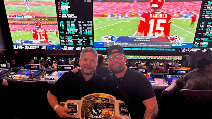 Winners of the Fantasy Football World Championships take their title belt to the sports book at Circa Resort and Casino in Las Vegas. 