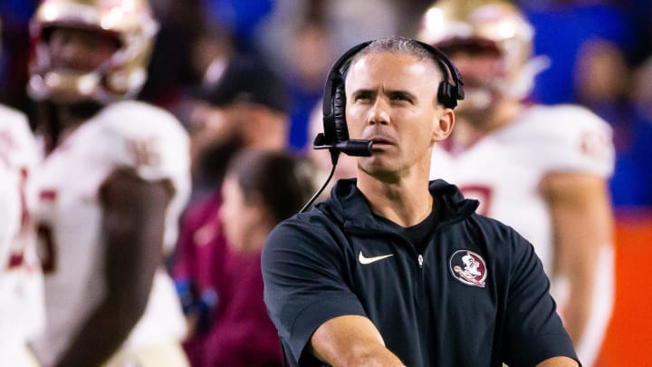 Florida State Seminoles head coach Mike Norvell looks to the replay screen at Steve Spurrier Field at Ben Hill Griffin Stadium in Gainesville, FL on Saturday, November 25, 2023 during the first half. [Doug Engle/Gainesville Sun]