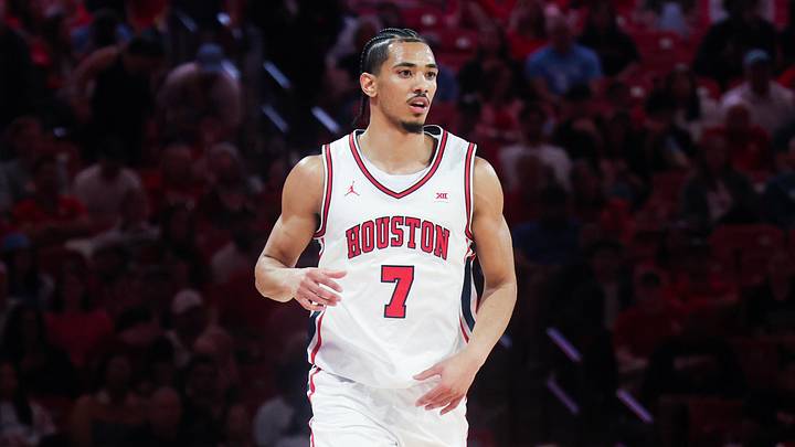 Feb 28, 2026; Houston, Texas, USA; Houston Cougars guard Milos Uzan (7) plays against the Colorado Buffaloes at Fertitta Center. Mandatory Credit: Thomas Shea-Imagn Images
