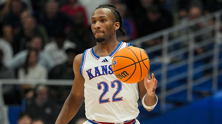 Nov 3, 2025; Lawrence, Kansas, USA; Kansas Jayhawks guard Darryn Peterson (22) dribbles during the second half against the Green Bay Phoenix at Allen Fieldhouse. Mandatory Credit: Jay Biggerstaff-Imagn Images