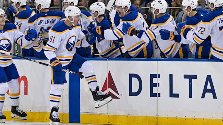 Nov 7, 2024; New York, New York, USA;  Buffalo Sabres center Sam Lafferty (81) celebrates his goal with the bench against the New York Rangers during the second period at Madison Square Garden. Mandatory Credit: Dennis Schneidler-Imagn Images