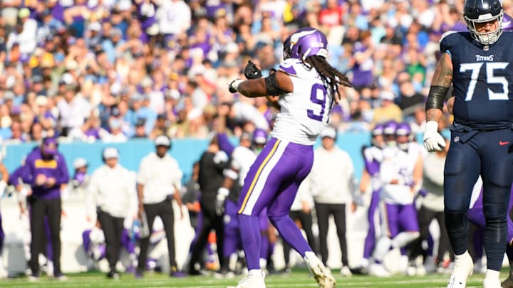 Nov 17, 2024; Nashville, Tennessee, USA; Minnesota Vikings linebacker Pat Jones II (91) celebrates his sack against Tennessee Titans Will Levis (8) during the first half at Nissan Stadium. Mandatory Credit: Steve Roberts-Imagn Images
