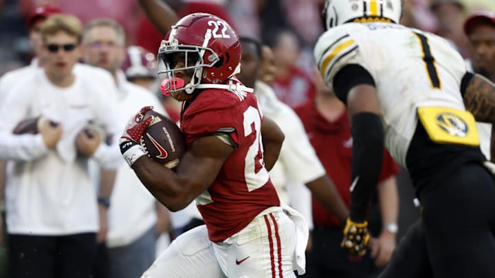 Oct 26, 2024; Tuscaloosa, Alabama, USA;  Alabama Crimson Tide running back Justice Haynes (22) carries the ball for a touchdown against the Missouri Tigers during the second half at Bryant-Denny Stadium.