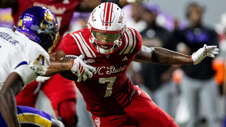 August 28, 2025: North Carolina State Wolfpack tight end Justin Joly (7) runs the ball against the East Carolina Pirates during the second half of the NCAA, College League, USA football match up at Carter-Finley Stadium in Raleigh, NC.