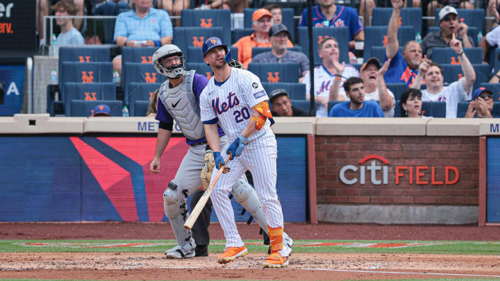 Jul 14, 2024; New York City, New York, USA; New York Mets first baseman Pete Alonso (20) looks up at his two run home run during the fourth inning in front of Colorado Rockies catcher Jacob Stallings (25) at Citi Field. Jul 14, 2024; New York City, New York, USA; New York Mets first baseman Pete Alonso (20) looks up at his two run home run during the fourth inning in front of Colorado Rockies catcher Jacob Stallings (25) at Citi Field.