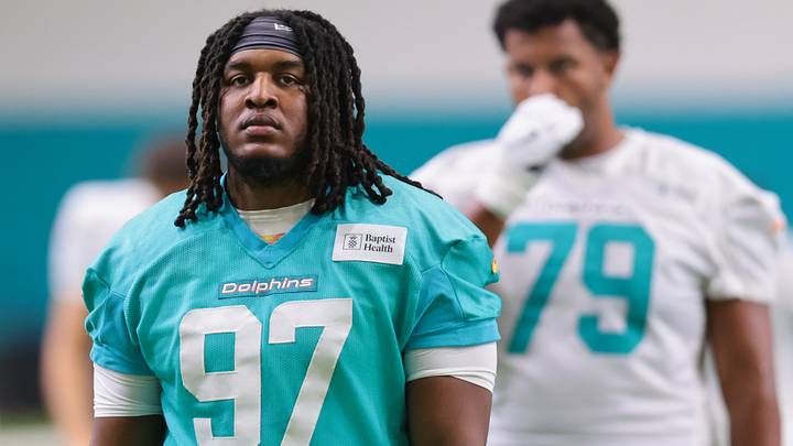 Miami Dolphins defensive lineman Keith Cooper Jr. (97) looks on during practice at the Baptist Health Training Complex. Miami Dolphins defensive lineman Keith Cooper Jr. (97) looks on during practice at the Baptist Health Training Complex.