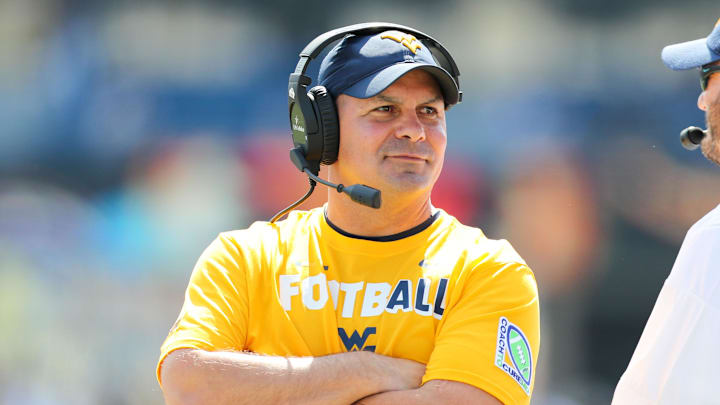Sep 16, 2017; Morgantown, WV, USA; West Virginia Mountaineers defensive coordinator Tony Gibson walks along the sidelines during the first quarter against the Delaware State Hornets at Milan Puskar Stadium. Sep 16, 2017; Morgantown, WV, USA; West Virginia Mountaineers defensive coordinator Tony Gibson walks along the sidelines during the first quarter against the Delaware State Hornets at Milan Puskar Stadium.