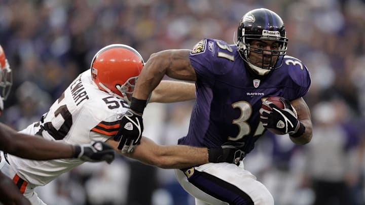 Dec 17, 2006; Baltimore, MD, USA; Baltimore Ravens running back (31) Jamal Lewis carries the ball as Cleveland Browns linebacker (52) Matt Stewart tackles him in the third quarter at M&T Bank Stadium in Baltimore, MD.  Mandatory Credit: James Lang-Imagn Images Copyright © James Lang