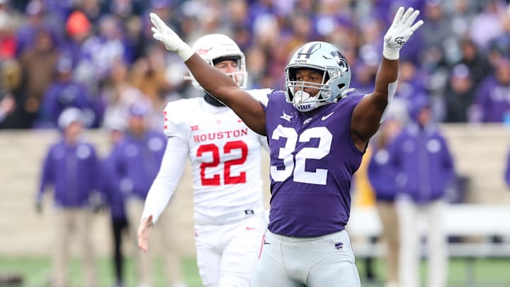 Oct 28, 2023; Manhattan, Kansas, USA; Kansas State Wildcats linebacker Desmond Purnell (32) celebrates a missed field goal by the Houston Cougars during the second quarter at Bill Snyder Family Football Stadium. Mandatory Credit: Scott Sewell-USA TODAY Sports