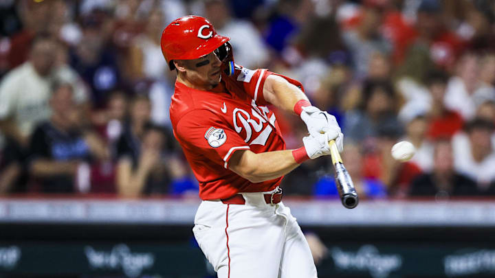 Cincinnati Reds first baseman Spencer Steer (7) hits a two-run triple 