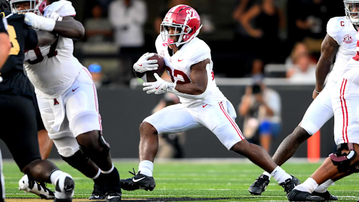 Oct 5, 2024; Nashville, Tennessee, USA;  Alabama Crimson Tide running back Justice Haynes (22) runs the ball against the Vanderbilt Commodores during the second half at FirstBank Stadium. Mandatory Credit: Steve Roberts-Imagn Images