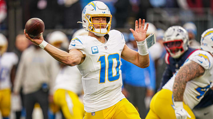 Los Angeles Chargers quarterback Justin Herbert (10) passes the ball against the New England Patriots in the third quarter at Gillette Stadium.