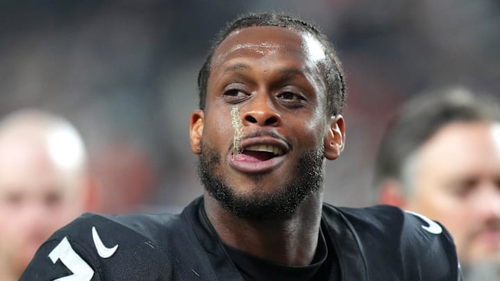 (EDITORS NOTE: obscene gesture in photo) Nov 23, 2025; Paradise, Nevada, USA; Vegas Raiders quarterback Geno Smith (7) gestures towards a fan after the Cleveland Browns defeated the Raiders 24-10 at Allegiant Stadium. Mandatory Credit: Stephen R. Sylvanie-Imagn Images 