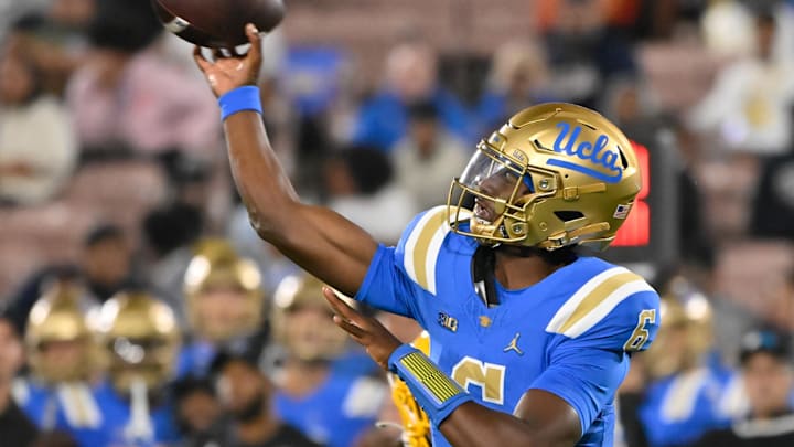Sep 28, 2024; Pasadena, California, USA; UCLA Bruins quarterback Justyn Martin (6) throws a pass during the fourth quarter against the Oregon Ducks at Rose Bowl. Mandatory Credit: Robert Hanashiro-Imagn Images