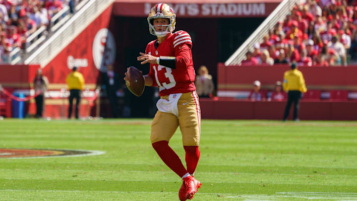 Sep 29, 2024; Santa Clara, California, USA; San Francisco 49ers quarterback Brock Purdy (13) prepares to pass the football against the New England Patriots during the first quarter at Levi's Stadium. Mandatory Credit: Neville E. Guard-Imagn Images