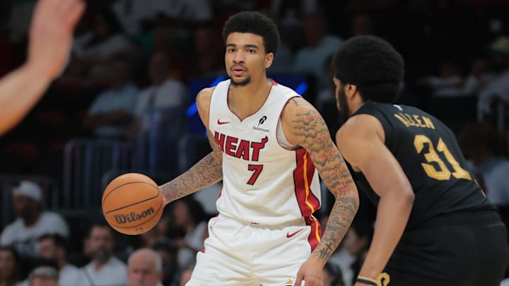 Apr 26, 2025; Miami, Florida, USA; Miami Heat center Kel'el Ware (7) dribbles the basketball as Cleveland Cavaliers center Jarrett Allen (31) defends in the third quarter during game three for the first round of the 2025 NBA Playoffs at Kaseya Center. Mandatory Credit: Sam Navarro-Imagn Images Apr 26, 2025; Miami, Florida, USA; Miami Heat center Kel'el Ware (7) dribbles the basketball as Cleveland Cavaliers center Jarrett Allen (31) defends in the third quarter during game three for the first round of the 2025 NBA Playoffs at Kaseya Center. Mandatory Credit: Sam Navarro-Imagn Images