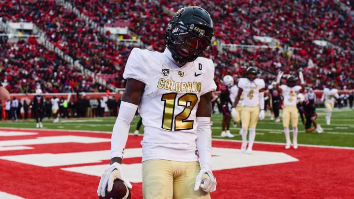 Nov 25, 2023; Salt Lake City, Utah, USA; Colorado Buffaloes athlete Travis Hunter (12) reacts after scoring a touchdown against the Utah Utes at Rice-Eccles Stadium. Mandatory Credit: Christopher Creveling-USA TODAY Sports Nov 25, 2023; Salt Lake City, Utah, USA; Colorado Buffaloes athlete Travis Hunter (12) reacts after scoring a touchdown against the Utah Utes at Rice-Eccles Stadium. Mandatory Credit: Christopher Creveling-USA TODAY Sports