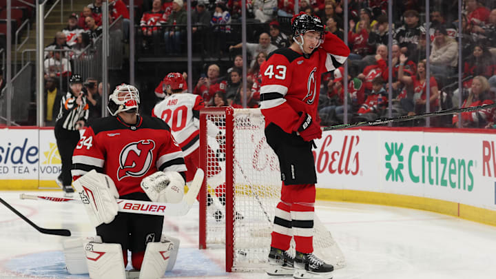 New Jersey Devils goaltender Jake Allen (34) and New Jersey Devils defenseman Luke Hughes (43): Ed Mulholland-Imagn Images