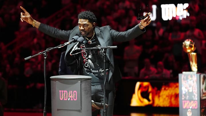 Jan 19, 2024; Miami, Florida, USA; Udonis Haslem speaks after his jersey was lifted to the rafters during the retirement ceremony during halftime of the game between the Miami Heat and the Atlanta Hawks Kaseya Center. Mandatory Credit: Jasen Vinlove-Imagn Images