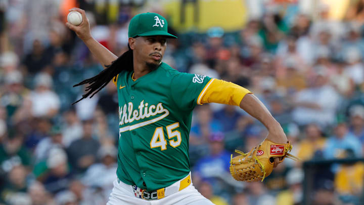 Aug 26, 2025; West Sacramento, California, USA; Athletics pitcher Osvaldo Bido (45) throws a pitch during the first inning against the Detroit Tigers at Sutter Health Park. Mandatory Credit: Sergio Estrada-Imagn Images