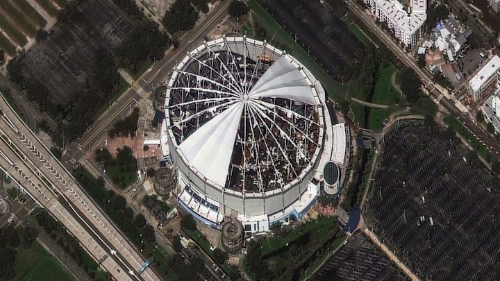 The roof of Tropicana Field, home of the Tampa Bay Rays MLB team, was torn off by Hurricane Milton's powerful winds. Satellite imagery from Maxar shows the destruction on Oct. 10, 2024. Prior to landfall, the stadium was converted into a base camp for emergency responders.