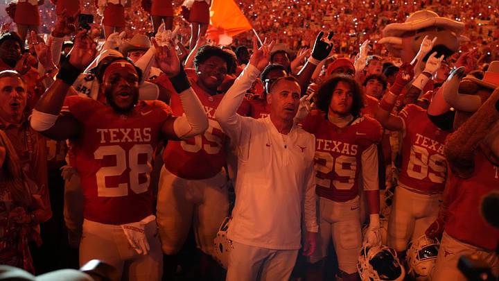 Texas Longhorns head coach Steve Sarkisian celebrates with fans and players after the game against the Mississippi Rebels at Darrell K. Royal-Texas Memorial Stadium. Texas Longhorns head coach Steve Sarkisian celebrates with fans and players after the game against the Mississippi Rebels at Darrell K. Royal-Texas Memorial Stadium.