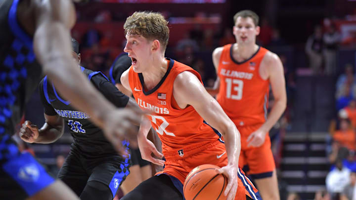 Nov 4, 2024; Champaign, Illinois, USA; Illinois Fighting Illini guard Kasparas Jakucionis (32) drives the ball during the first half against the Eastern Illinois Panthers at State Farm Center. Mandatory Credit: Ron Johnson-Imagn Images Nov 4, 2024; Champaign, Illinois, USA; Illinois Fighting Illini guard Kasparas Jakucionis (32) drives the ball during the first half against the Eastern Illinois Panthers at State Farm Center. Mandatory Credit: Ron Johnson-Imagn Images