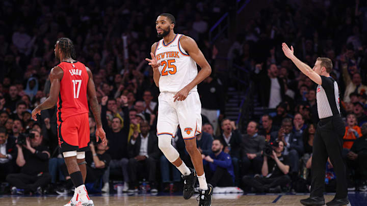 Feb 3, 2025; New York, New York, USA; New York Knicks forward Mikal Bridges (25) reacts after making a three point basket during the first half against the Houston Rockets at Madison Square Garden. Mandatory Credit: Vincent Carchietta-Imagn Images