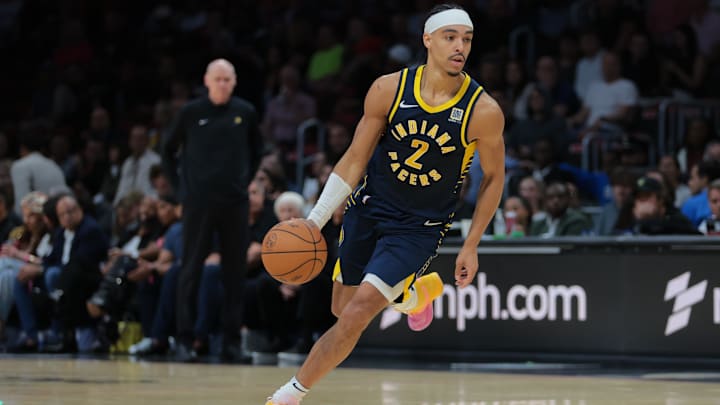 Feb 28, 2025; Miami, Florida, USA; Indiana Pacers guard Andrew Nembhard (2) drives to the basket against the Miami Heat during the second quarter at Kaseya Center. Mandatory Credit: Sam Navarro-Imagn Images
