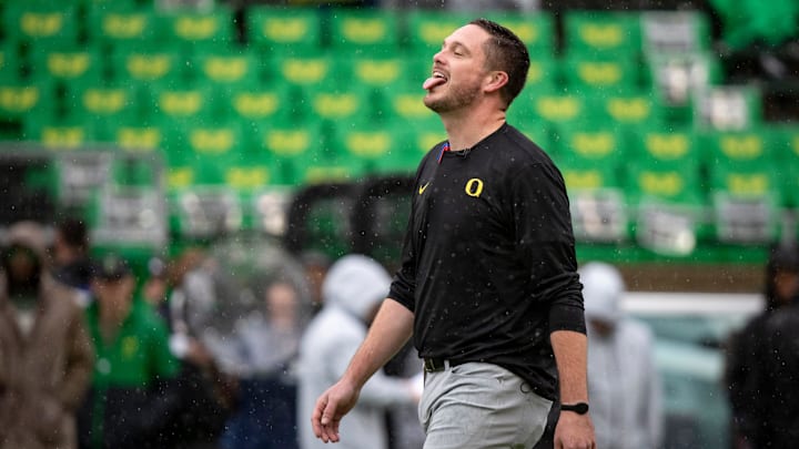 Oregon head coach Dan Lanning sticks his tongue out to catch the rain as the No. 6 Oregon Ducks host California Saturday, Nov. 4, 2023, at Autzen Stadium in Eugene, Ore.