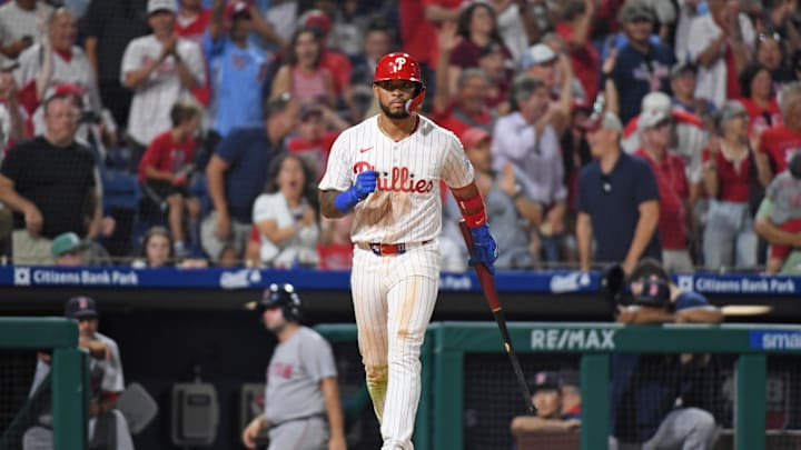 Jul 21, 2025; Philadelphia, Pennsylvania, USA; Philadelphia Phillies second base Edmundo Sosa (33) reacts after getting the walk-off win on a catcher's interference call during the tenth inning against the Boston Red Sox at Citizens Bank Park. Mandatory Credit: Eric Hartline-Imagn Images
