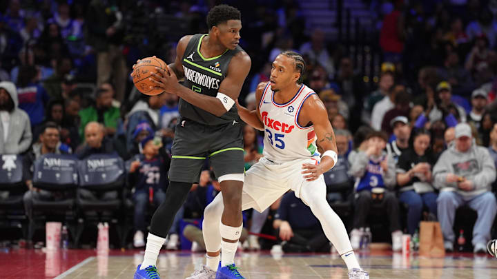Minnesota Timberwolves guard Anthony Edwards controls the ball against Philadelphia 76ers forward Marcus Bagley in the second quarter at Wells Fargo Center in Philadelphia on April 5, 2025.
