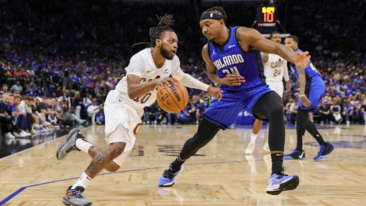 May 3, 2024; Orlando, Florida, USA; Cleveland Cavaliers guard Darius Garland (10) drives around Orlando Magic center Wendell Carter Jr. (34) during the second half of game six of the first round for the 2024 NBA playoffs at Kia Center. Mandatory Credit: Mike Watters-Imagn Images