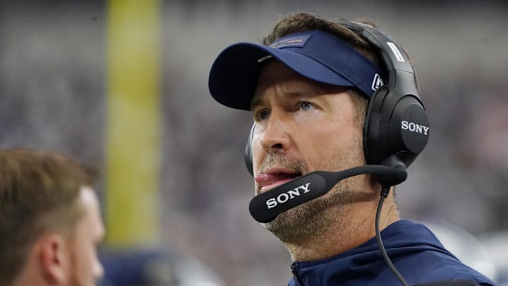 Sep 14, 2025; Arlington, Texas, USA; Dallas Cowboys head coach Brian Schottenheimer looks on during the first quarter at AT&T Stadium. 
