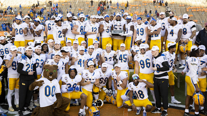 Dec 30, 2022; El Paso, Texas, USA; The Pittsburgh Panthers celebrate after defeating the UCLA Bruins, 37-35, in the 2022 Sun Bowl at the Sun Bowl. Mandatory Credit: Ivan Pierre Aguirre-Imagn Images