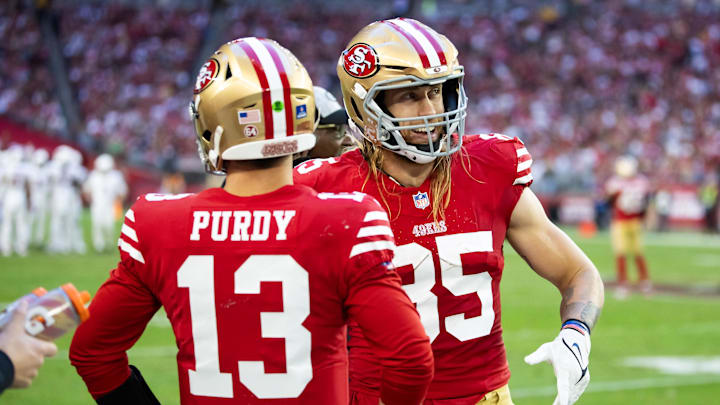 Dec 17, 2023; Glendale, Arizona, USA; San Francisco 49ers tight end George Kittle (85) with quarterback Brock Purdy (13) against the Arizona Cardinals at State Farm Stadium. Mandatory Credit: Mark J. Rebilas-USA TODAY Sports Dec 17, 2023; Glendale, Arizona, USA; San Francisco 49ers tight end George Kittle (85) with quarterback Brock Purdy (13) against the Arizona Cardinals at State Farm Stadium. Mandatory Credit: Mark J. Rebilas-USA TODAY Sports