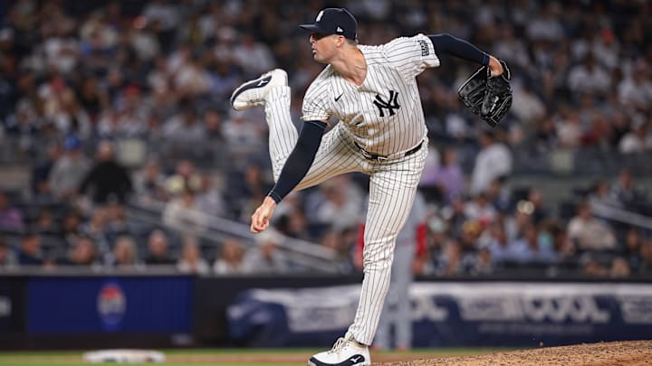 Aug 30, 2024; Bronx, New York, USA; New York Yankees relief pitcher Clay Holmes (35) follows through after delivering a pitch during the ninth inning against the St. Louis Cardinals at Yankee Stadium. Mandatory Credit: Vincent Carchietta-Imagn Images