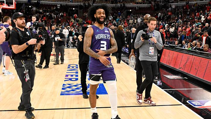 Charlotte Hornets guard Coby White (3) walks toward former Chicago Bulls teammates Charlotte Hornets guard Coby White (3) walks toward former Chicago Bulls teammates