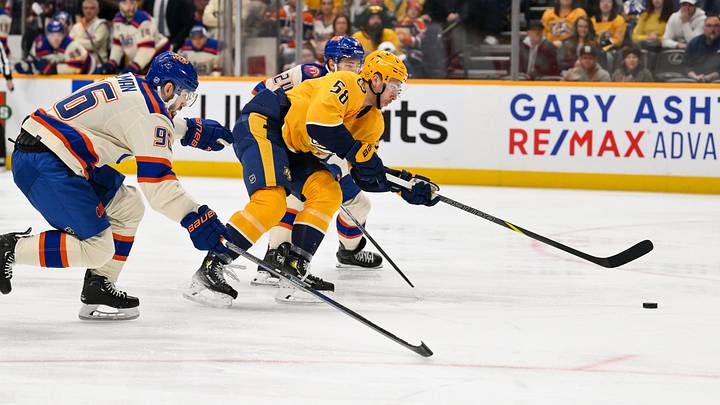 Jan 13, 2026; Nashville, Tennessee, USA; Nashville Predators left wing Michael Bunting (58) skates between Edmonton Oilers defenseman Jake Walman (96) and defenseman Spencer Stastney (24) during the first period at Bridgestone Arena. Mandatory Credit: Steve Roberts-Imagn Images Jan 13, 2026; Nashville, Tennessee, USA; Nashville Predators left wing Michael Bunting (58) skates between Edmonton Oilers defenseman Jake Walman (96) and defenseman Spencer Stastney (24) during the first period at Bridgestone Arena. Mandatory Credit: Steve Roberts-Imagn Images